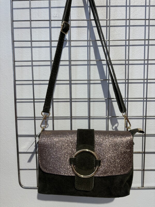 Pieni tummanvihreä nahkalaukku